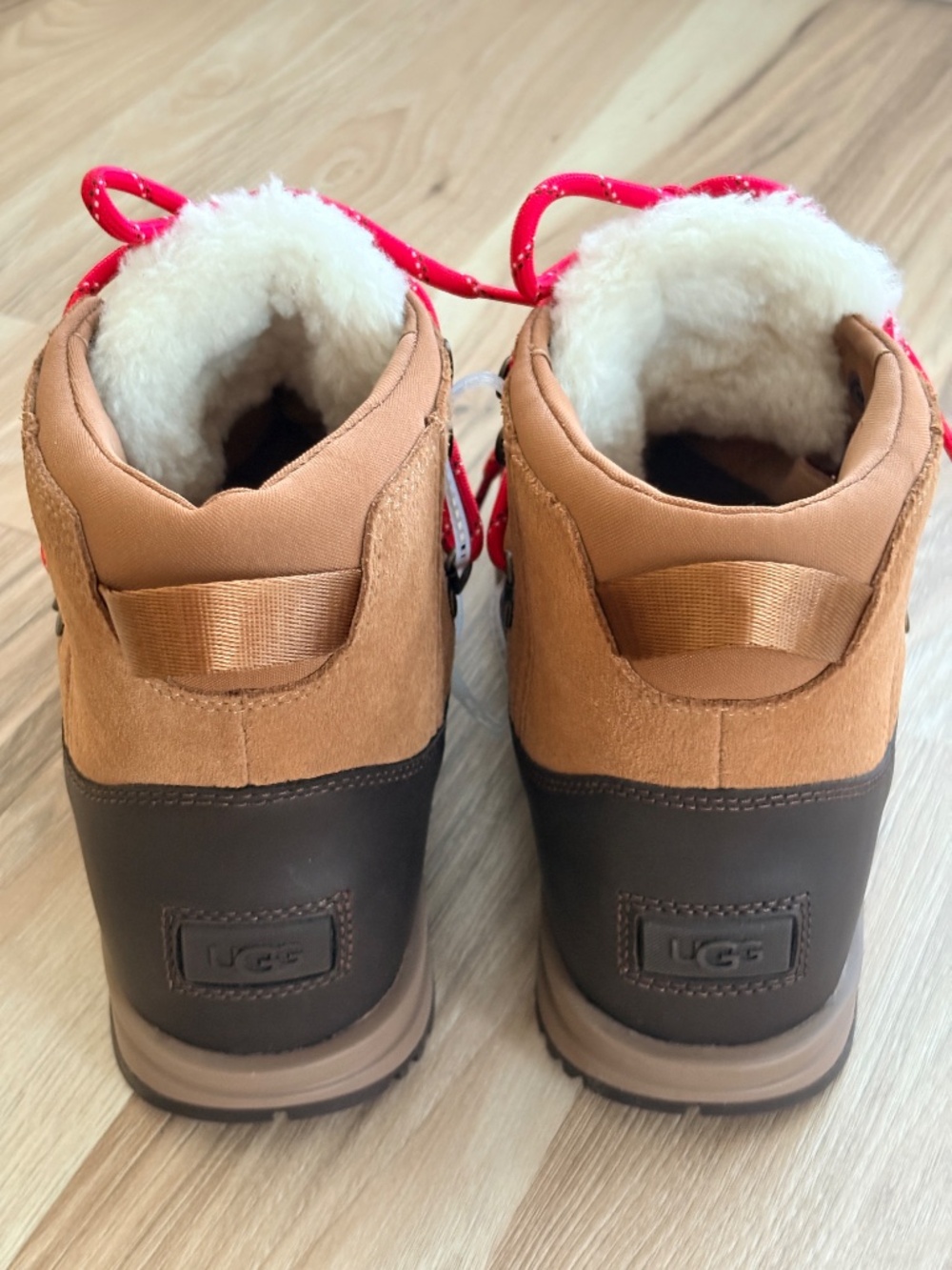 UGG bracken hiking boots feature chestnut suede uppers and vibrant red laces. - Picture 2 of 9